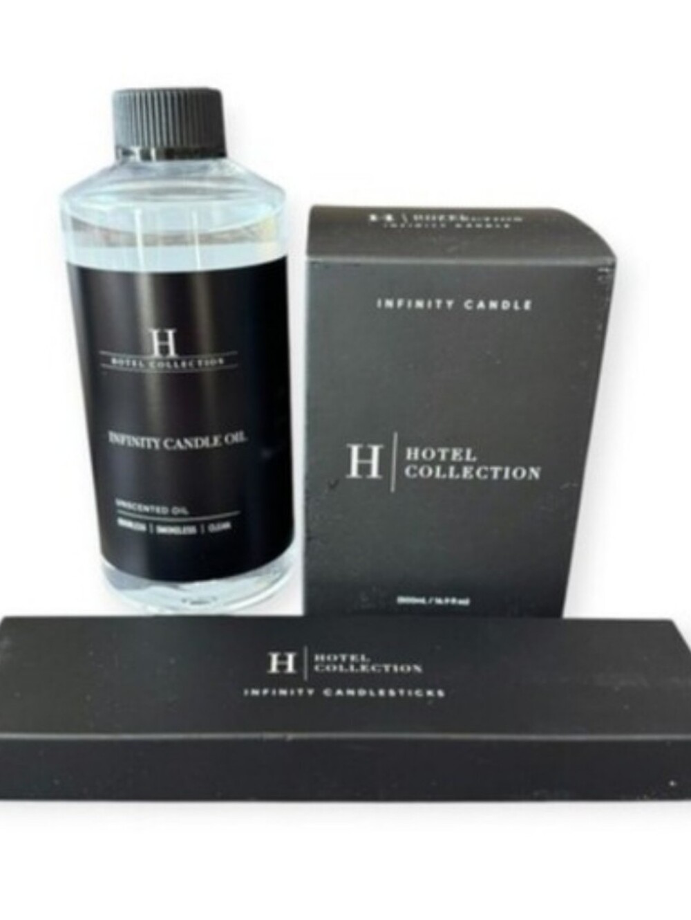 NIB Hotel Collection Clear Glass Vessel Infinity Candle